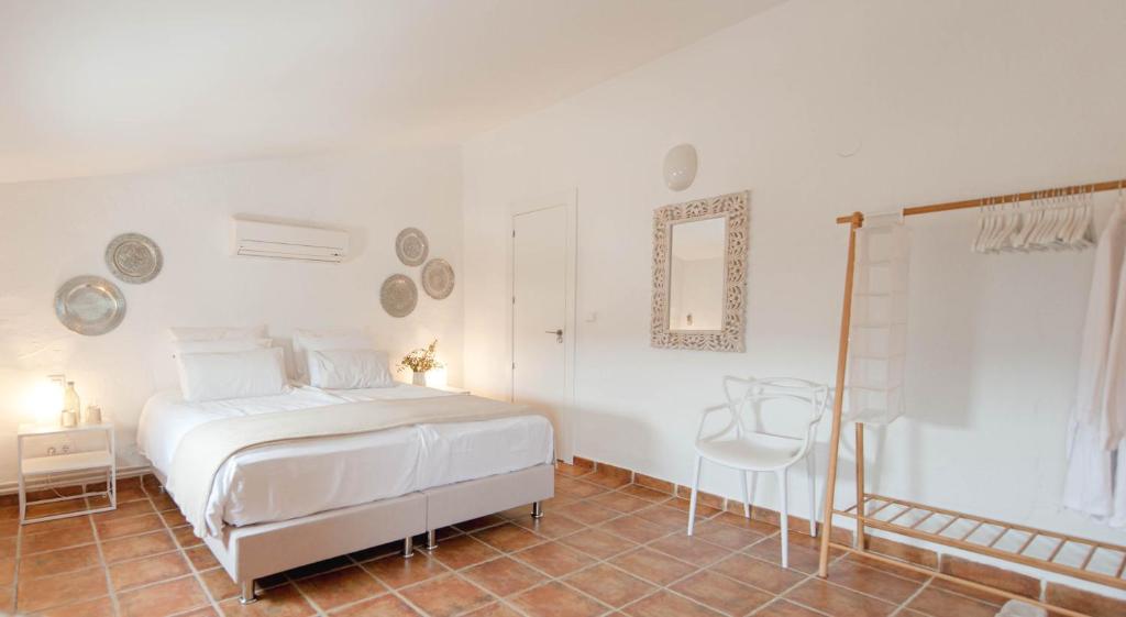 Postel nebo postele na pokoji v ubytování Boutique Bed & Breakfast Casa Paco - adults only