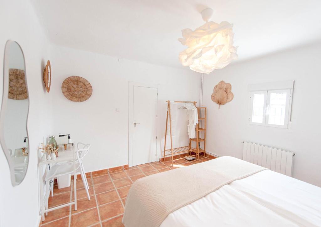 Postel nebo postele na pokoji v ubytování Boutique Bed & Breakfast Casa Paco - adults only