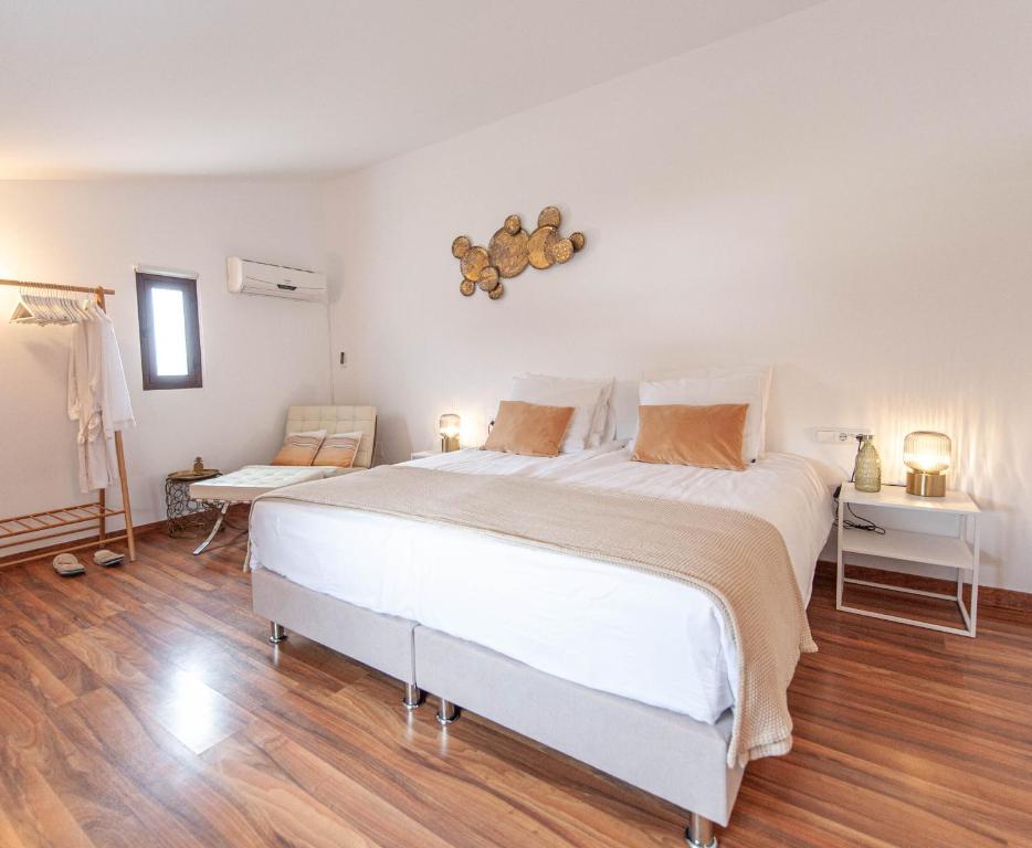 Postel nebo postele na pokoji v ubytování Boutique Bed & Breakfast Casa Paco - adults only