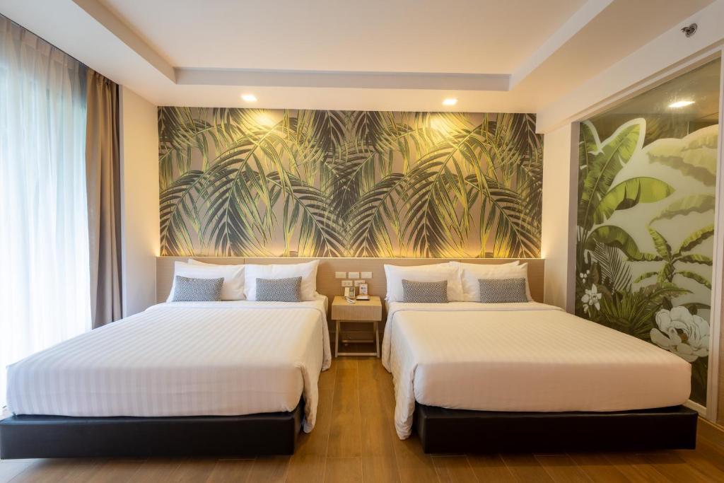 Postel nebo postele na pokoji v ubytování Panan Krabi Resort