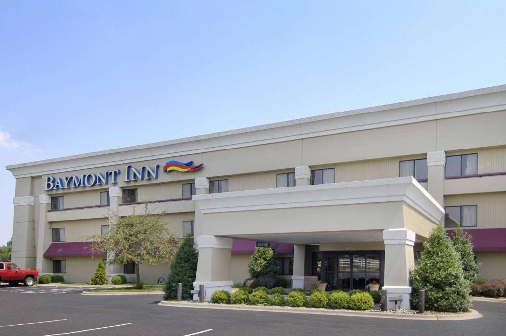 a building with a sign on the front of it at Baymont by Wyndham Corydon in Corydon