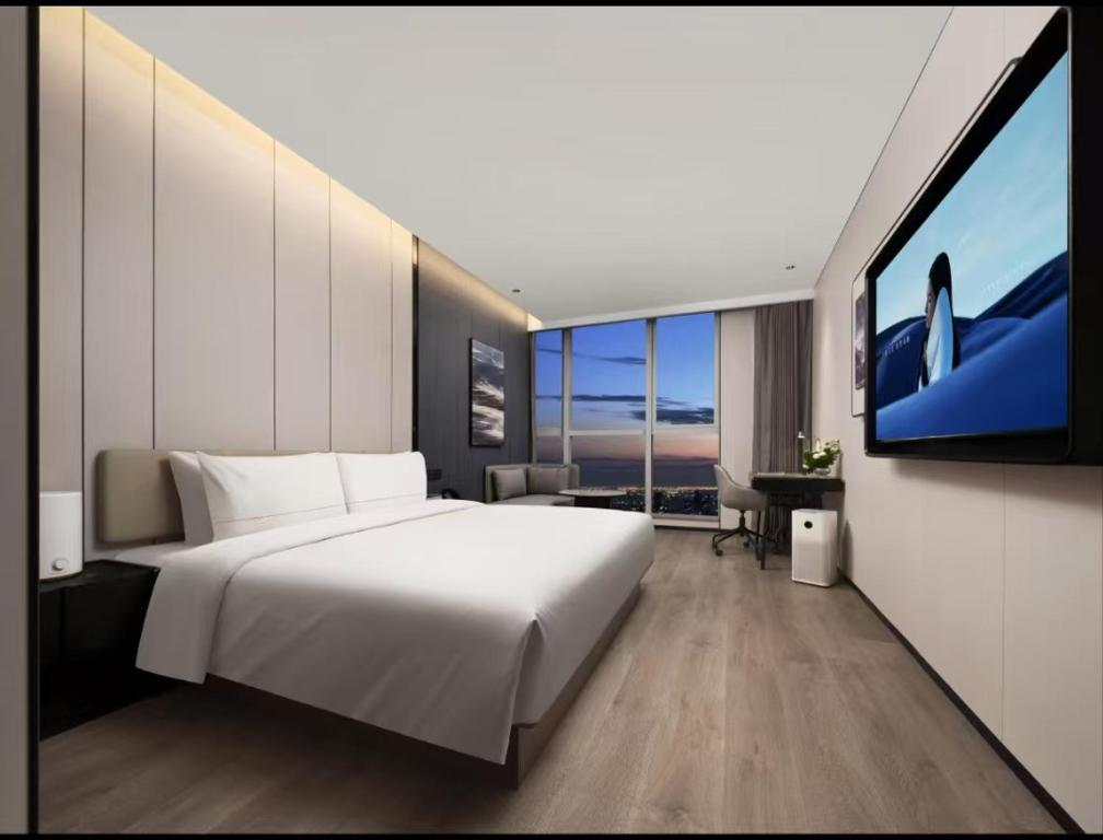 Tempat tidur dalam kamar di Atour Hotel Xi'an High-tech Software City