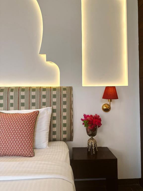 Postel nebo postele na pokoji v ubytování Hotel Atulyaa Taj