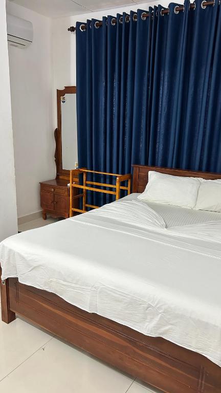 Postel nebo postele na pokoji v ubytování Himo Guest Inn