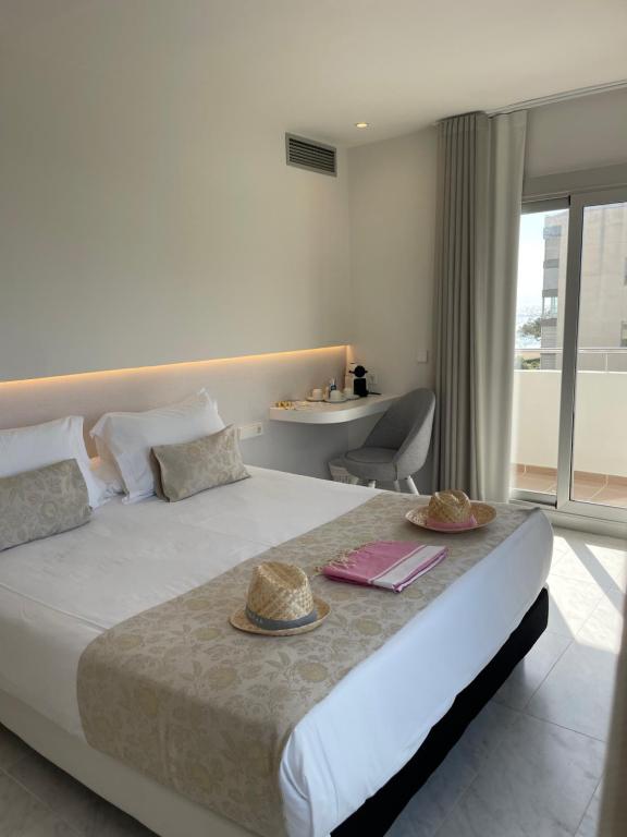 Postel nebo postele na pokoji v ubytování Hotel Aromar