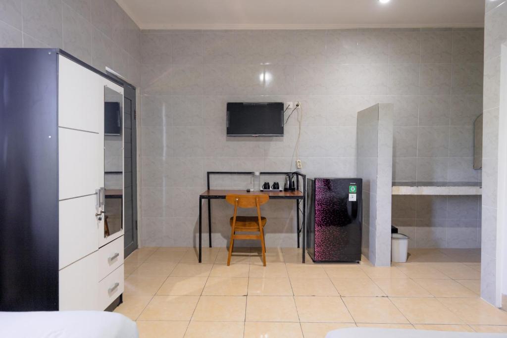 Kuchyň nebo kuchyňský kout v ubytování Urbanview Ava Guest House Goa Gong
