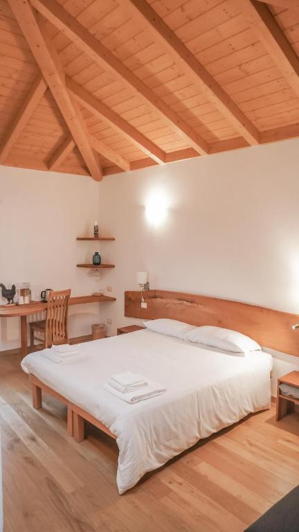 Postel nebo postele na pokoji v ubytování Cascina Bagaggera