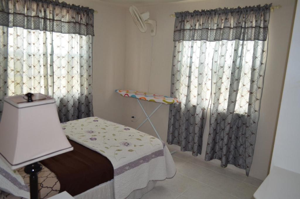 Postel nebo postele na pokoji v ubytování JersonApartments