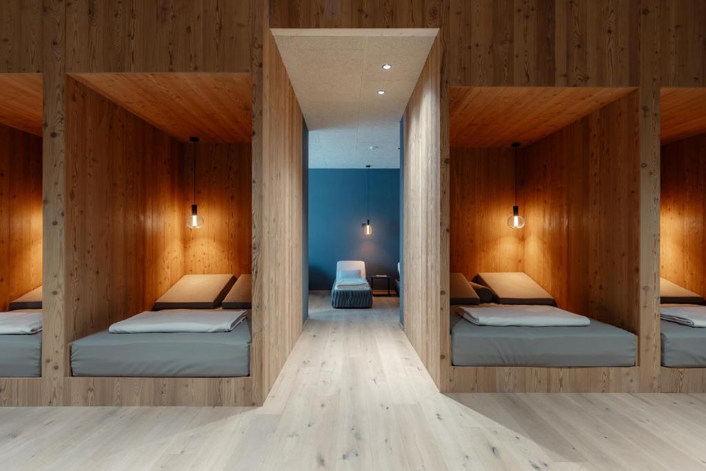 Postel nebo postele na pokoji v ubytování Hotel Tofana Cortina