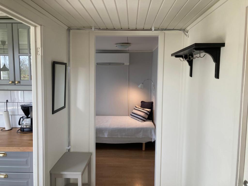 Postel nebo postele na pokoji v ubytování Slimmingegården 1019