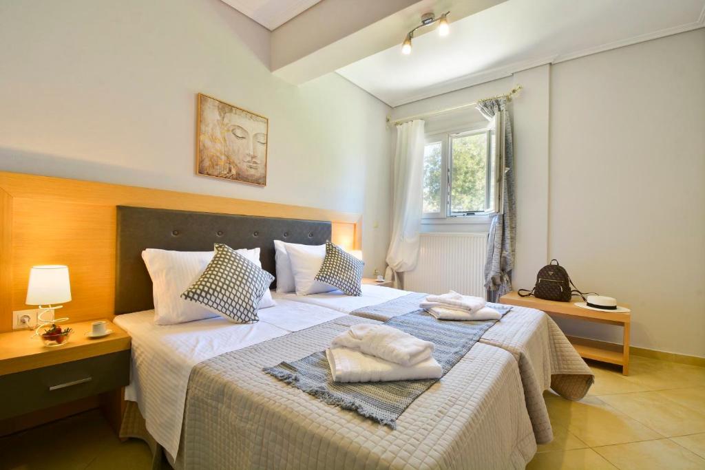 Ένα ή περισσότερα κρεβάτια σε δωμάτιο στο SBG Cozy Home