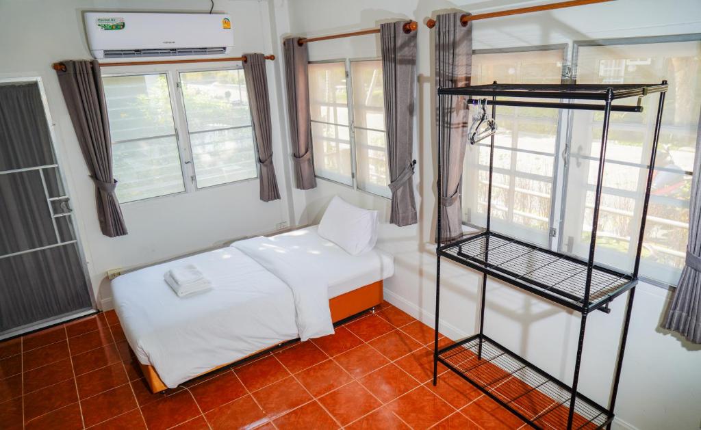 Postel nebo postele na pokoji v ubytování Luna Hut Resort
