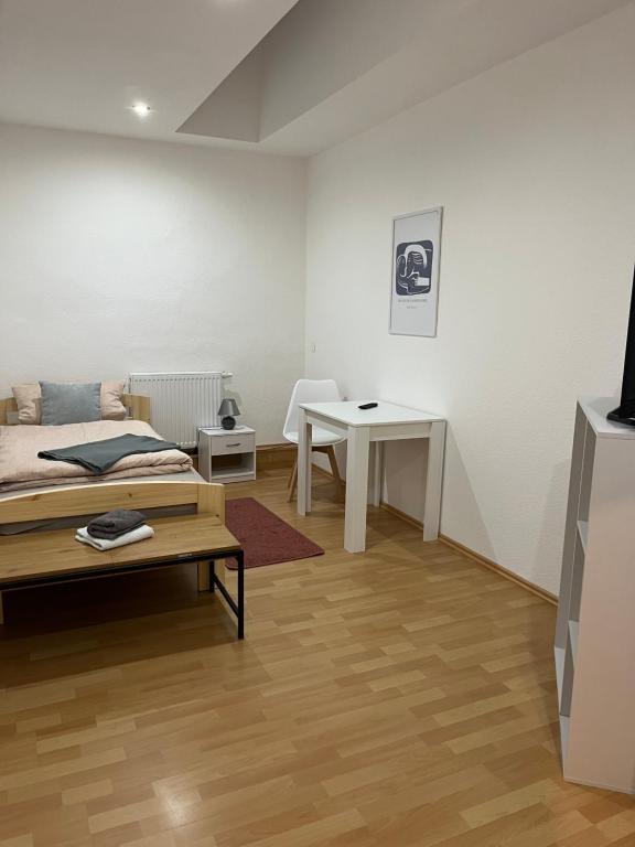 TV a/nebo společenská místnost v ubytování Pension Palm