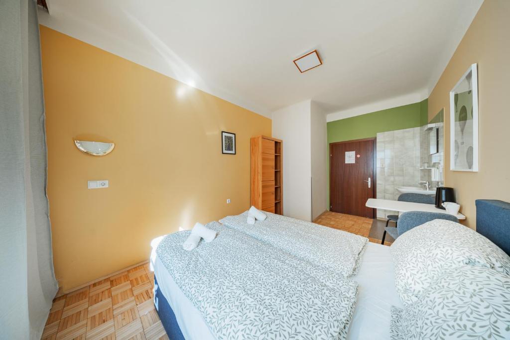 Postel nebo postele na pokoji v ubytování Vienna West Rooms