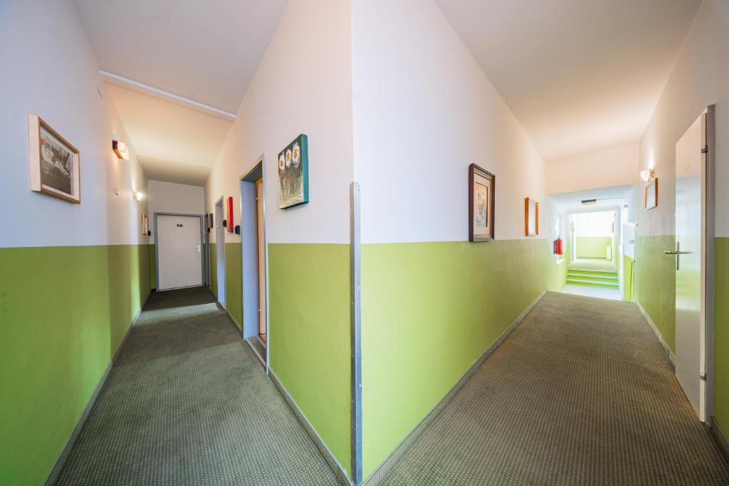 Postel nebo postele na pokoji v ubytování Vienna West Business Inn