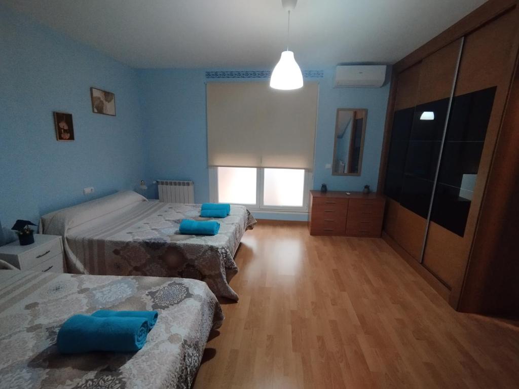Posteľ alebo postele v izbe v ubytovaní Apartamento Alhondiga Hervás