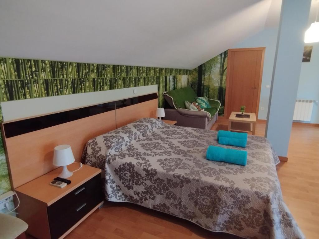 Posteľ alebo postele v izbe v ubytovaní Apartamento Alhondiga Hervás