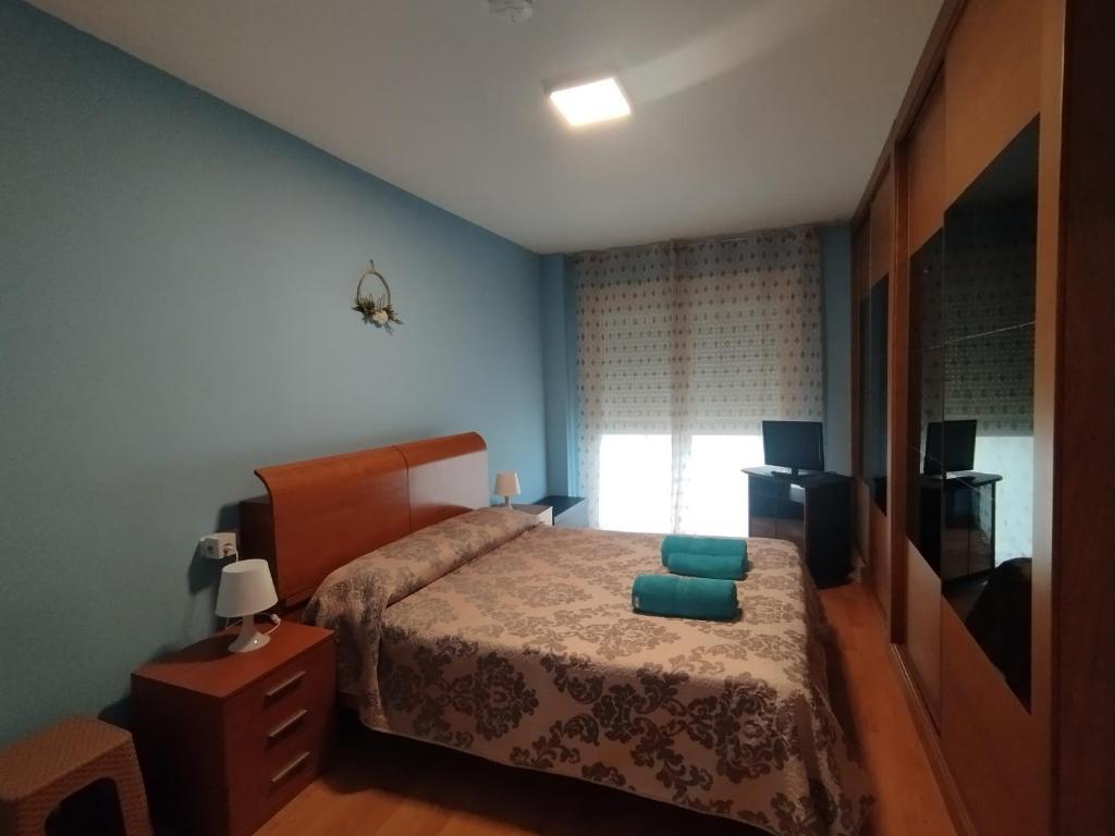 Posteľ alebo postele v izbe v ubytovaní Apartamento Alhondiga Hervás