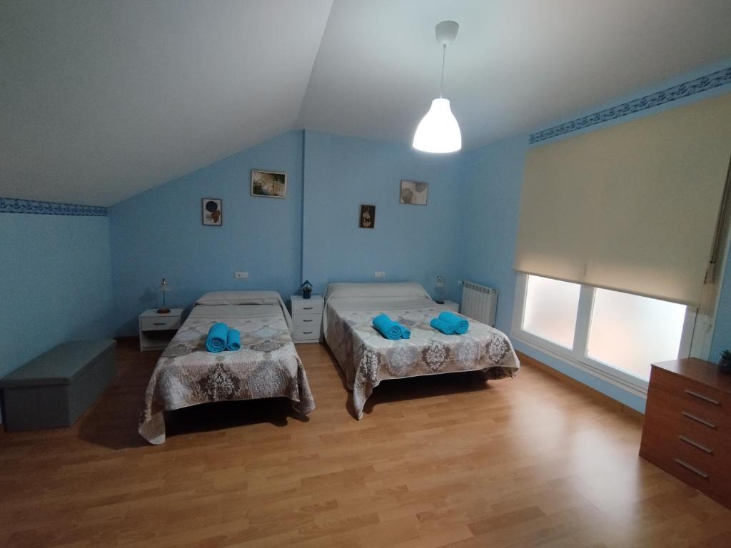 Posteľ alebo postele v izbe v ubytovaní Apartamento Alhondiga Hervás