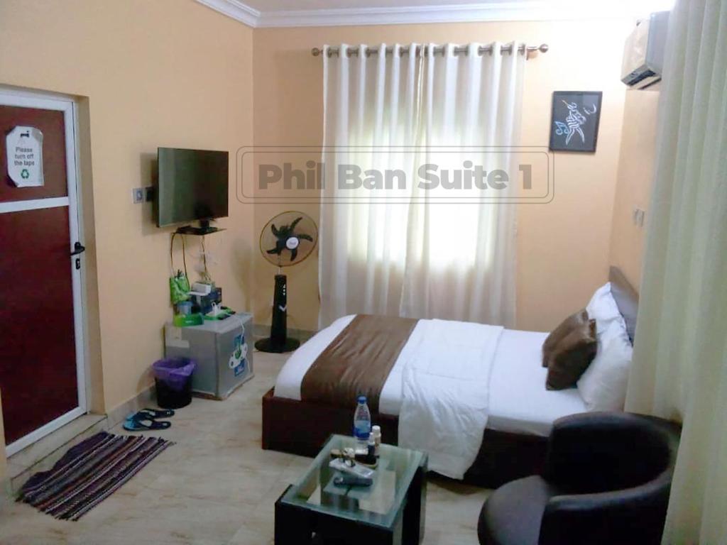 Postel nebo postele na pokoji v ubytování Ban Guest House