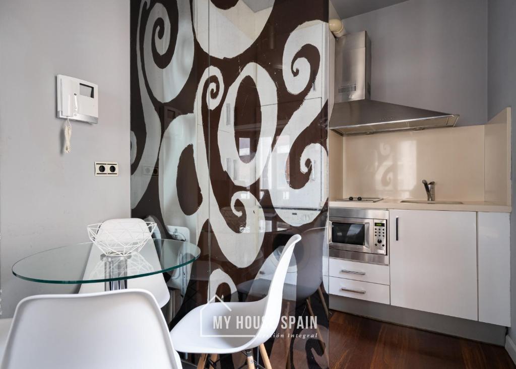 Kuchyň nebo kuchyňský kout v ubytování MyHouseSpain - Apartamentos Moros 41