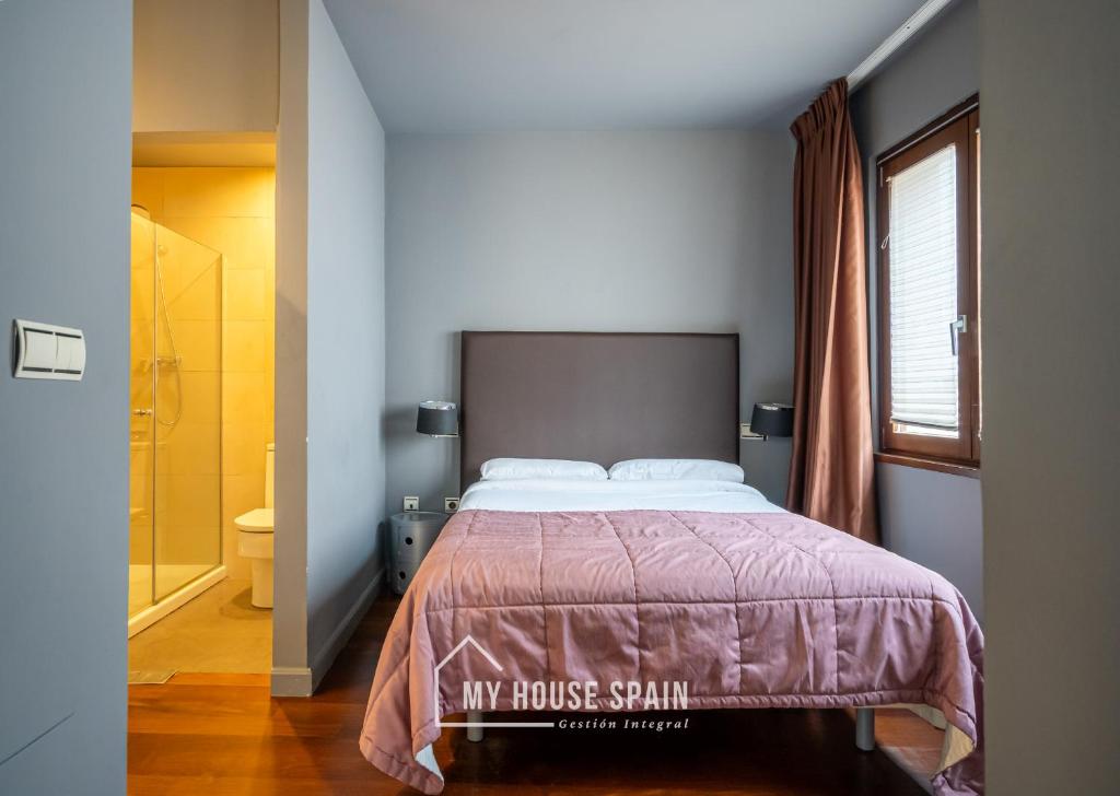 Postel nebo postele na pokoji v ubytování MyHouseSpain - Apartamentos Moros 41