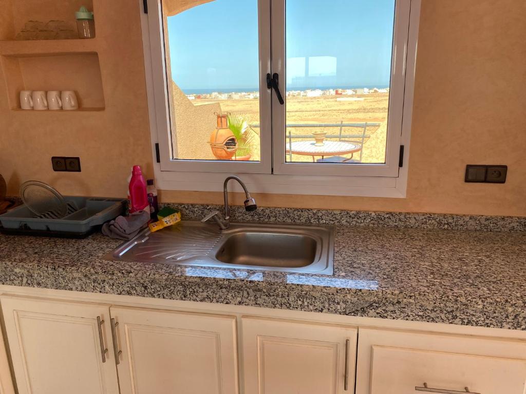 Een keuken of kitchenette bij Tawada