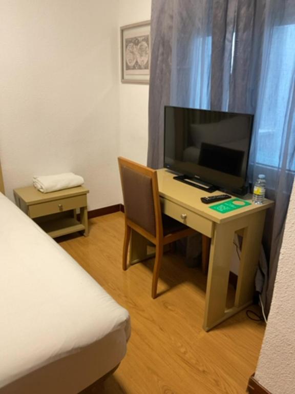 TV a/nebo společenská místnost v ubytování Hotel Mercado by gaiarooms