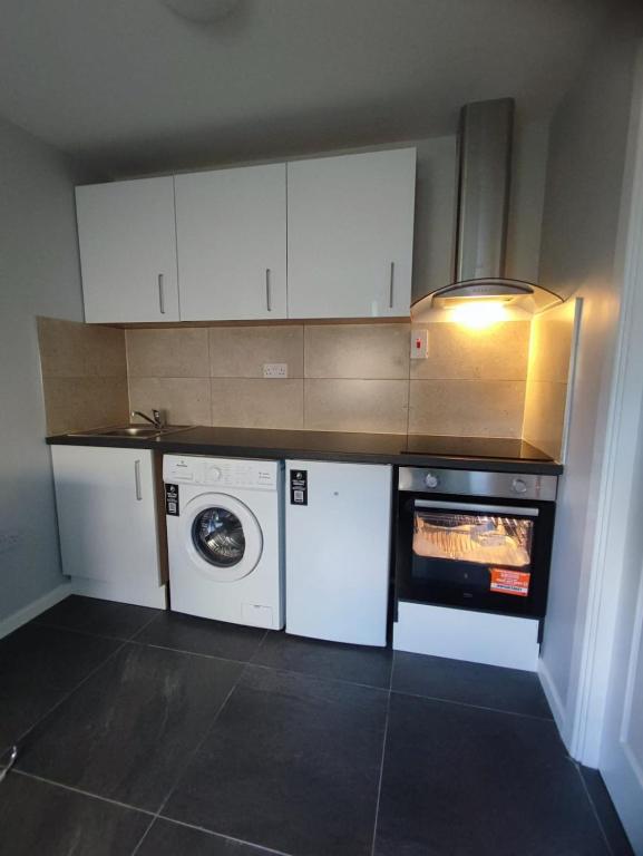 Kuchyň nebo kuchyňský kout v ubytování Cozy Private Self-Contained Suite