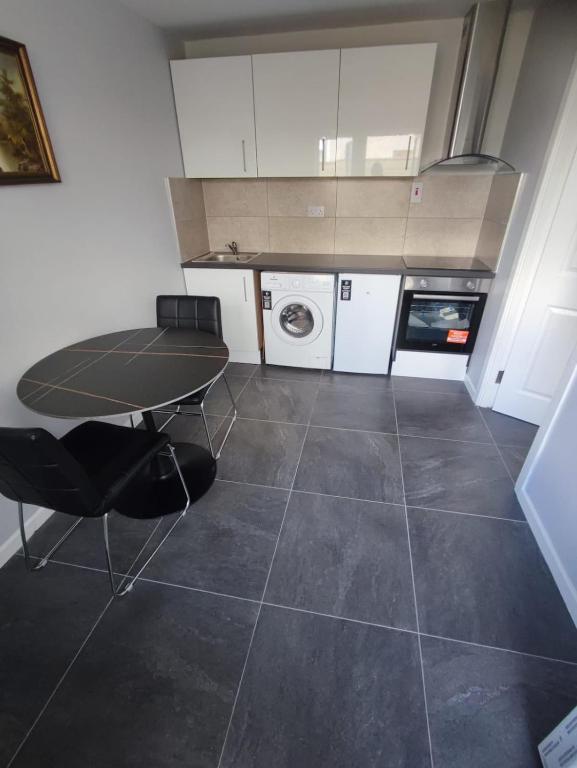 Kuchyň nebo kuchyňský kout v ubytování Cozy Private Self-Contained Suite