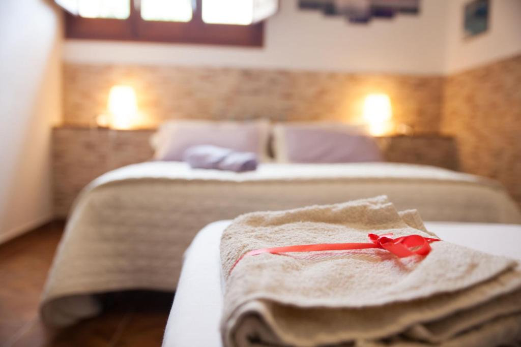Postel nebo postele na pokoji v ubytování villa amodeo
