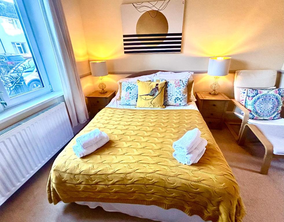 Postel nebo postele na pokoji v ubytování A cozy retreat in the heart of Ilkley