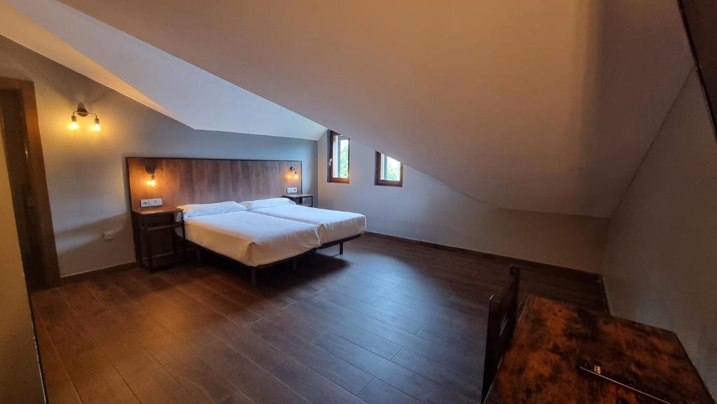 Postel nebo postele na pokoji v ubytování Euba Hotel