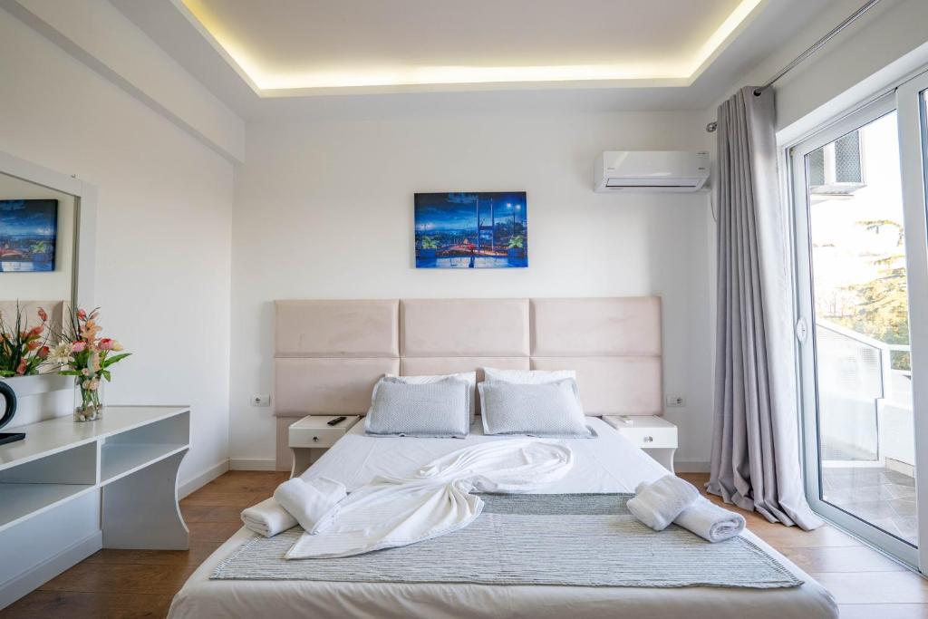 Postel nebo postele na pokoji v ubytování Hotel Myrtai - City Center