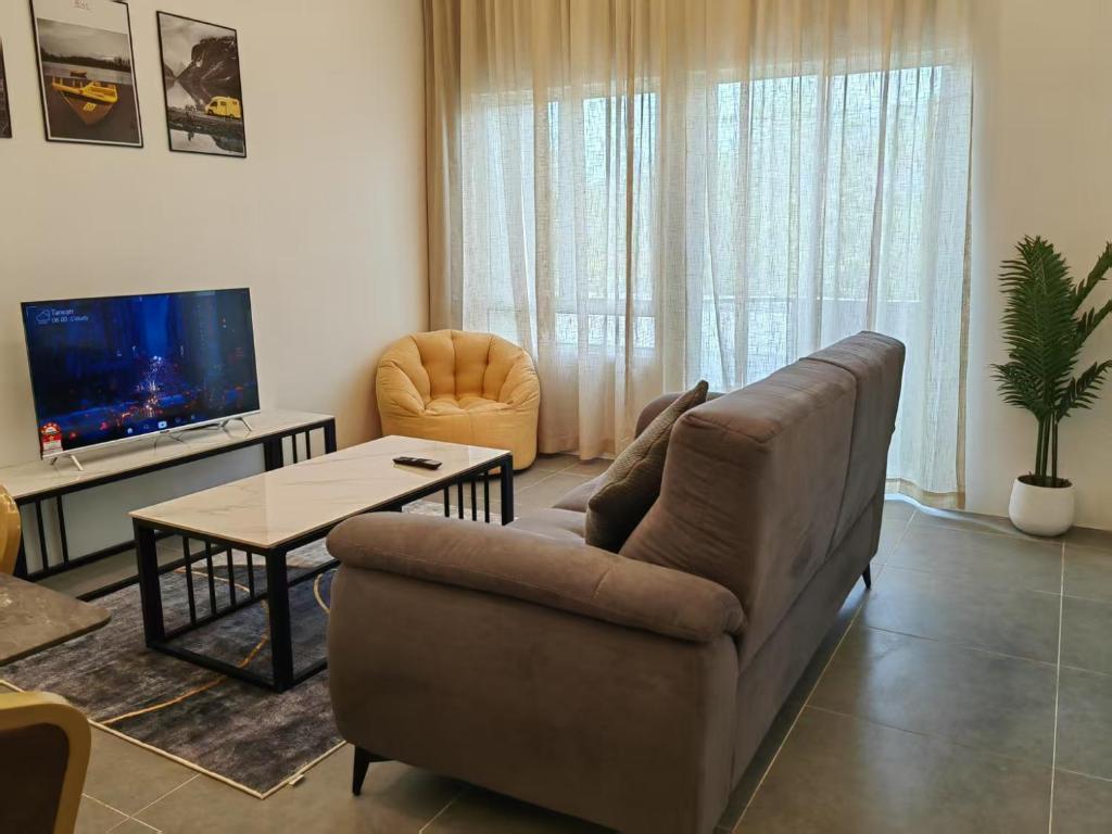 TV a/nebo společenská místnost v ubytování Soft Langkawi 09