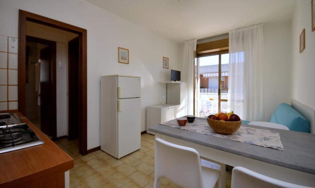 Kuchyňa alebo kuchynka v ubytovaní Condominio Fenice