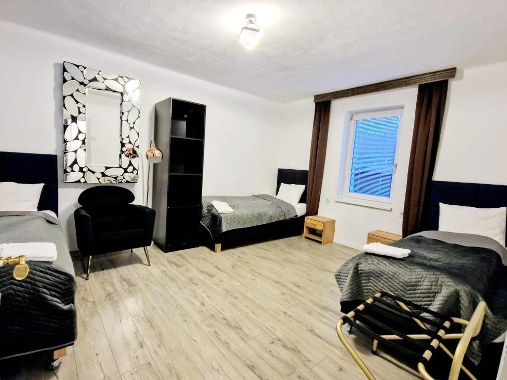 Postel nebo postele na pokoji v ubytování Tiny Apartments 07 am Viehofner See