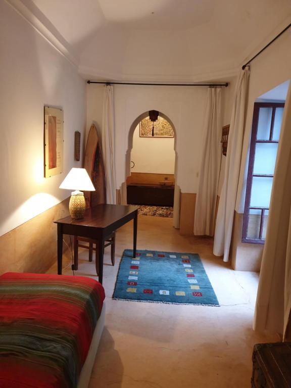 Postel nebo postele na pokoji v ubytování Riad Karmela