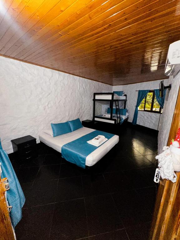 Postel nebo postele na pokoji v ubytování Hotel Mawill