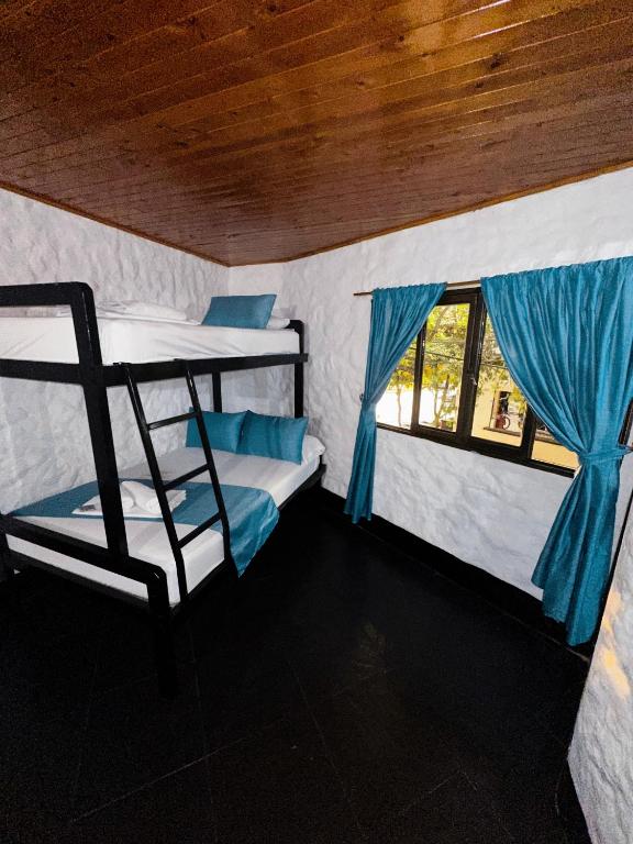 Postel nebo postele na pokoji v ubytování Hotel Mawill