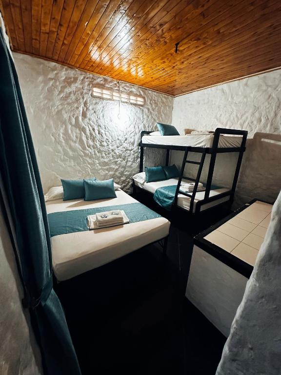Postel nebo postele na pokoji v ubytování Hotel Mawill