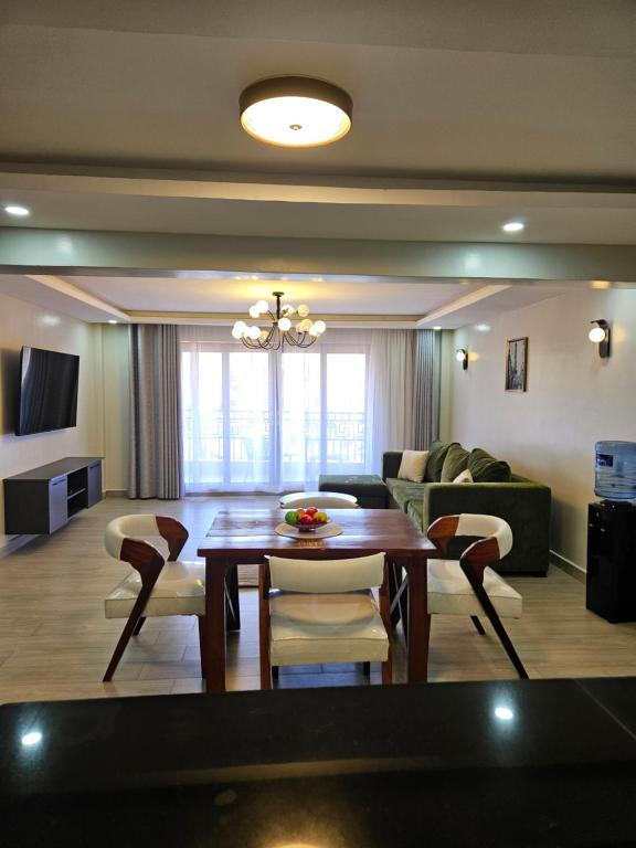 TV a/nebo společenská místnost v ubytování Lumo Residences Eldoret