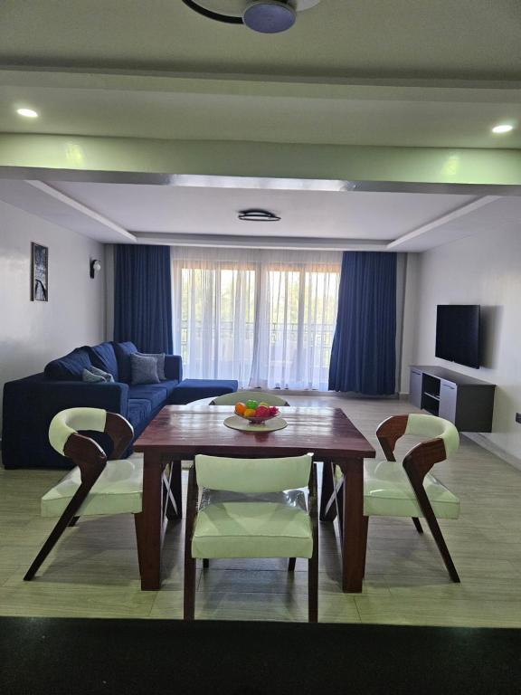 TV a/nebo společenská místnost v ubytování Lumo Residences Eldoret