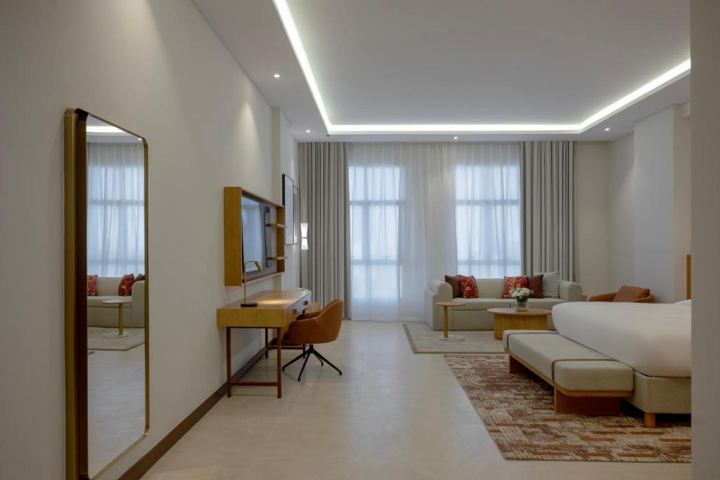 Postel nebo postele na pokoji v ubytování Mercure Hotel Khamis Mushait by Accor