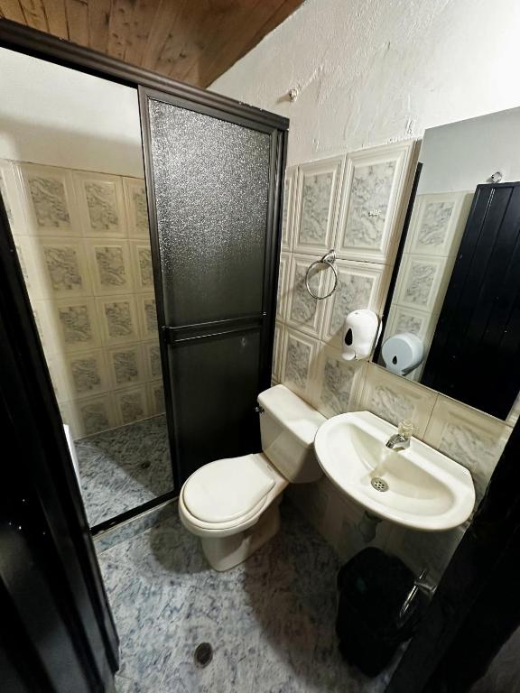 Koupelna v ubytování Hotel Mawill