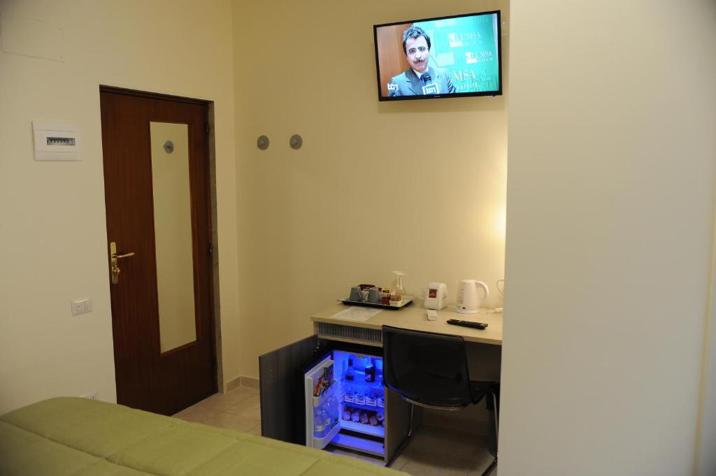 TV a/nebo společenská místnost v ubytování Dimore Le Lucane