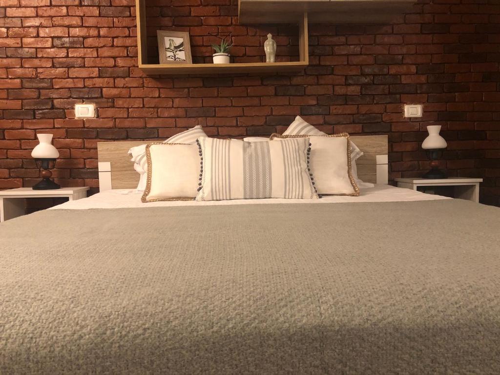 Postel nebo postele na pokoji v ubytování Cozy Residence Brasov