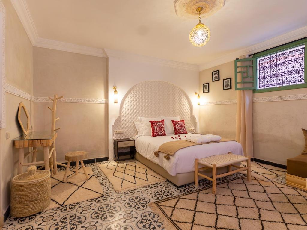 Postel nebo postele na pokoji v ubytování Riad Dar Lamia