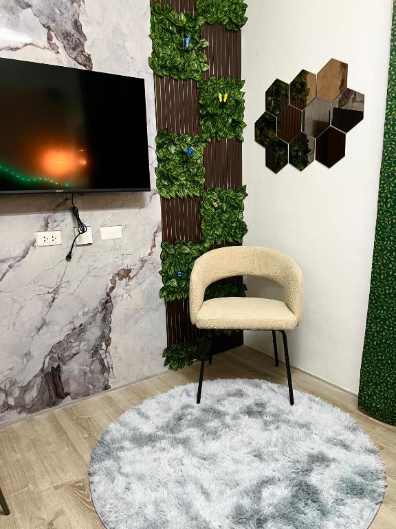 Televiisor ja/või meelelahutuskeskus majutusasutuses H2G Mesavirre Garden Residence