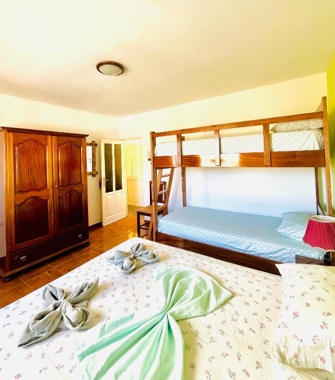 Postel nebo postele na pokoji v ubytování Casa BB&Djassi